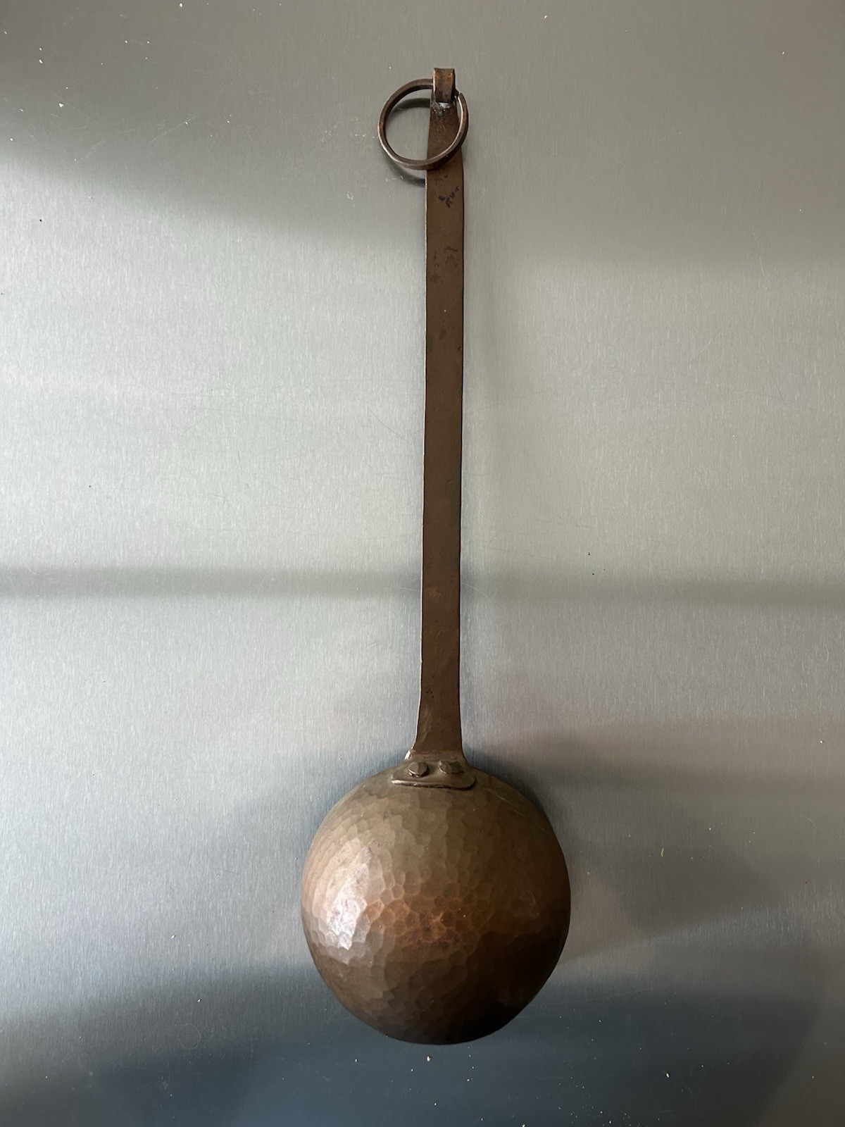 18” antique hand-forged copper ladle with a long 13” decorated iron handle