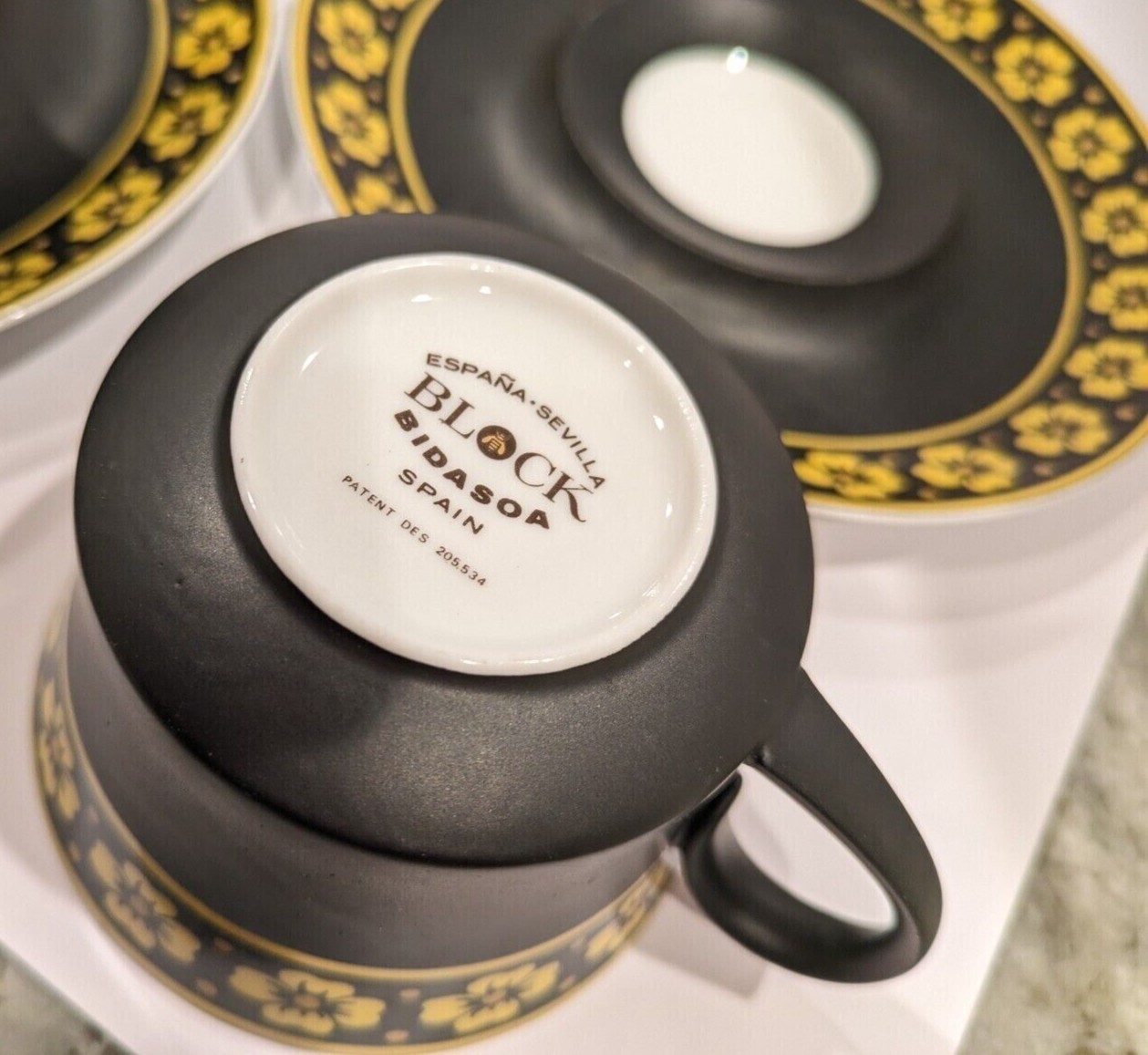 Sevilla by Block Bidasoa Teacup and Saucer Set, Black w. Yellow Flowers
