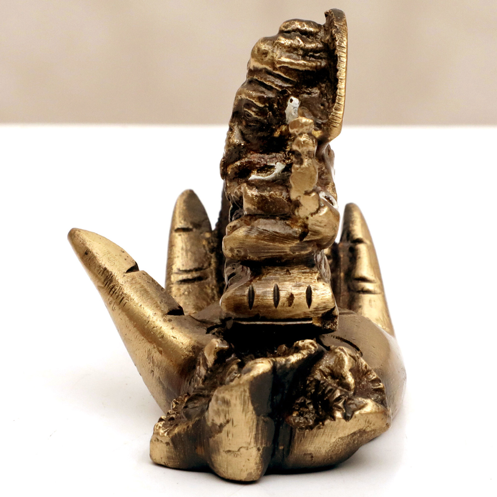 KRAFTSKALA Ganesh Idol on a Palm, Handcrafted Brass Statue, 0.33 LB, 3Lx2H Inch