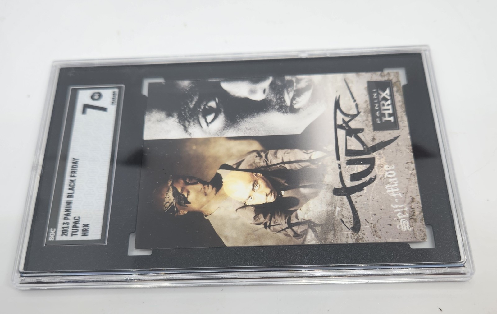 2013 Panini Black Friday Tupac Self – Made, Panini HRX Graded 7 by SGC
