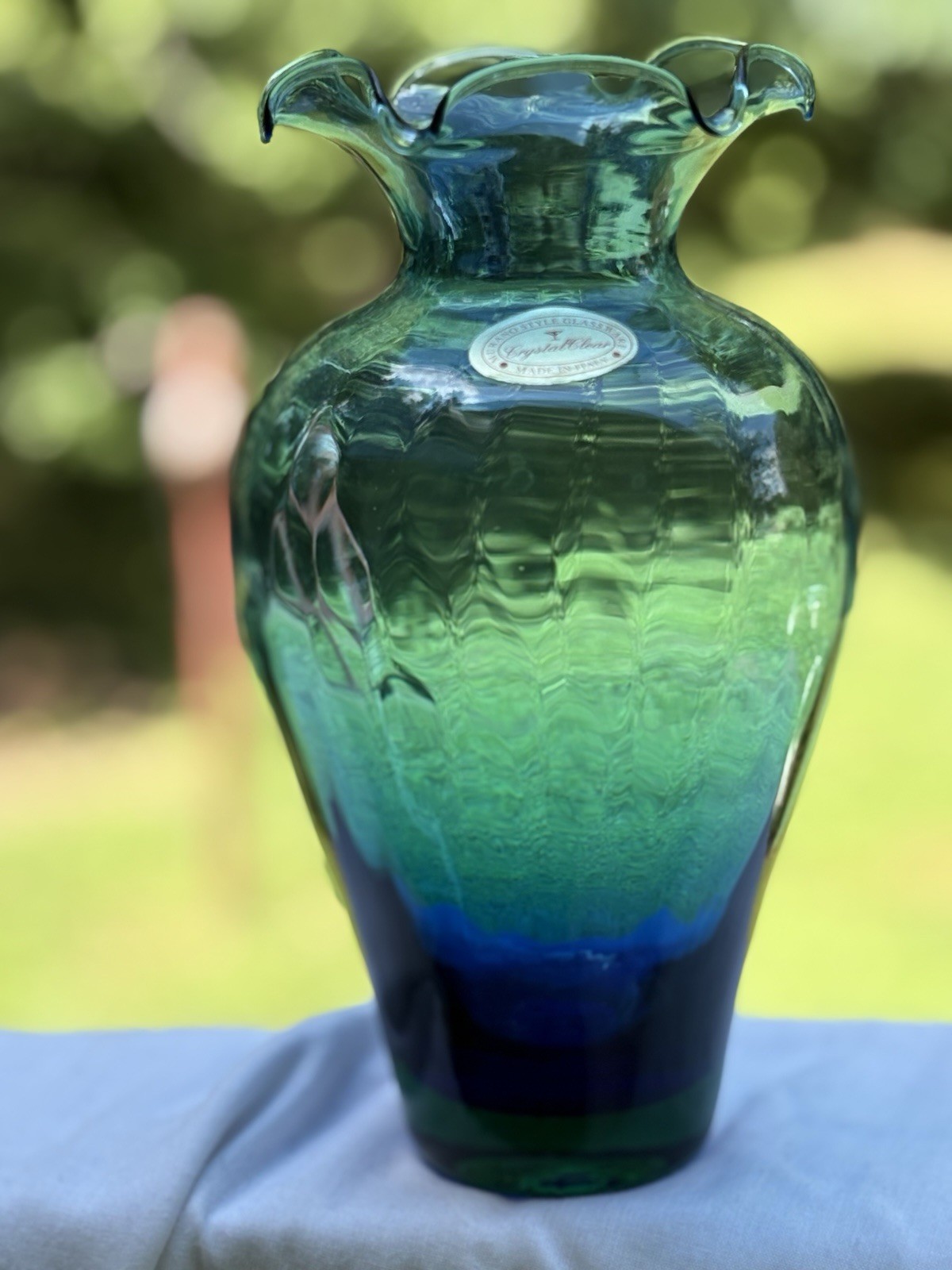 Murano Style Glassware Vase. 8.75 inches tall. Blue w/ Green Solid Bottom.