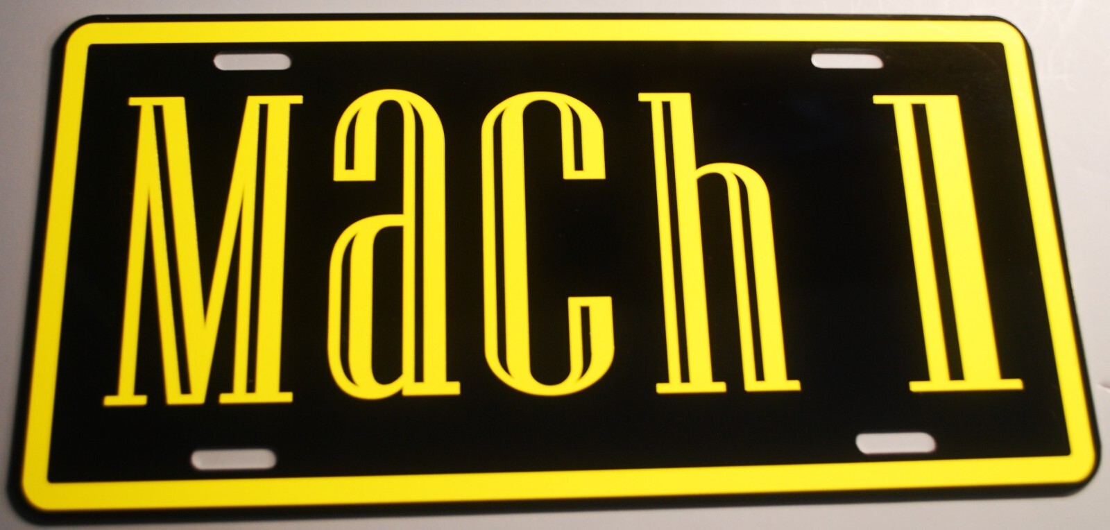 MACH 1 METAL LICENSE PLATE BLACK W/ YELLOW FITS FORD MUSTANG 302 351 429
