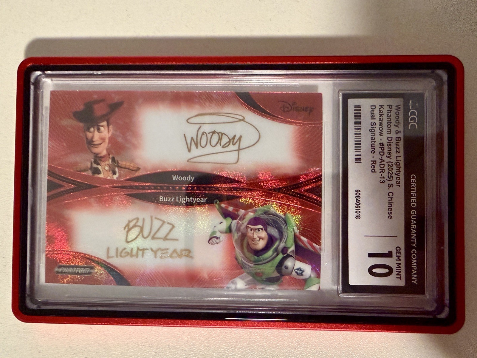 2025 Kakawow Phantom Disney Woody & Buzz Rainbow Dual Auto Red #19/75 CGC 10