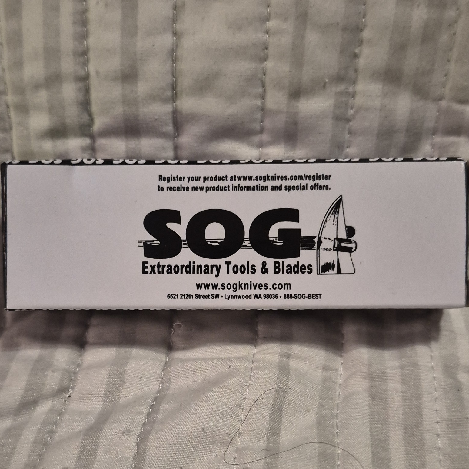 SOG Pocketknife Folding Silver Stainless Steel Plain Edge Clip Point Liner Lock