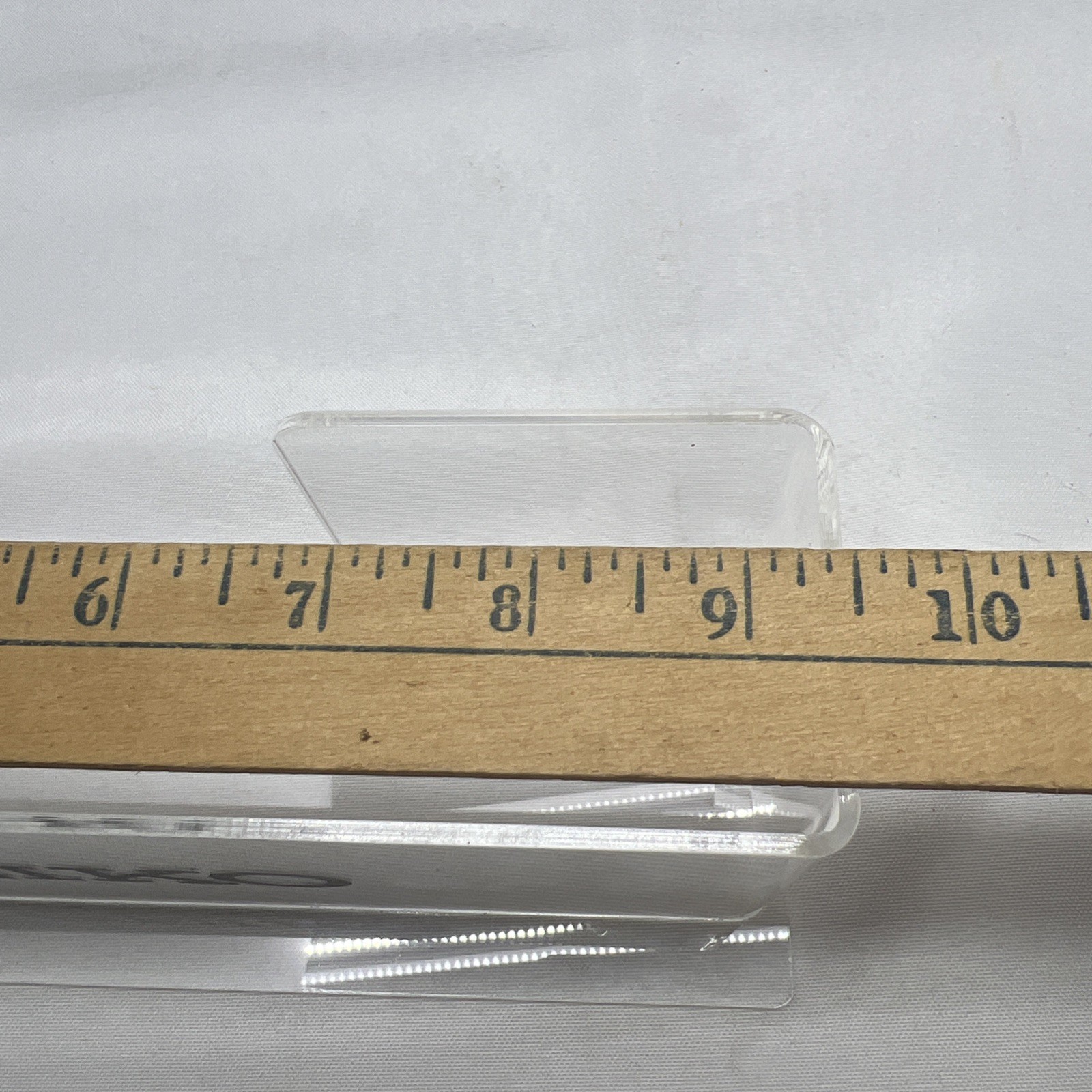 clear acrylic Seiko branded display holder 9 7/8” Long – 4” Tall