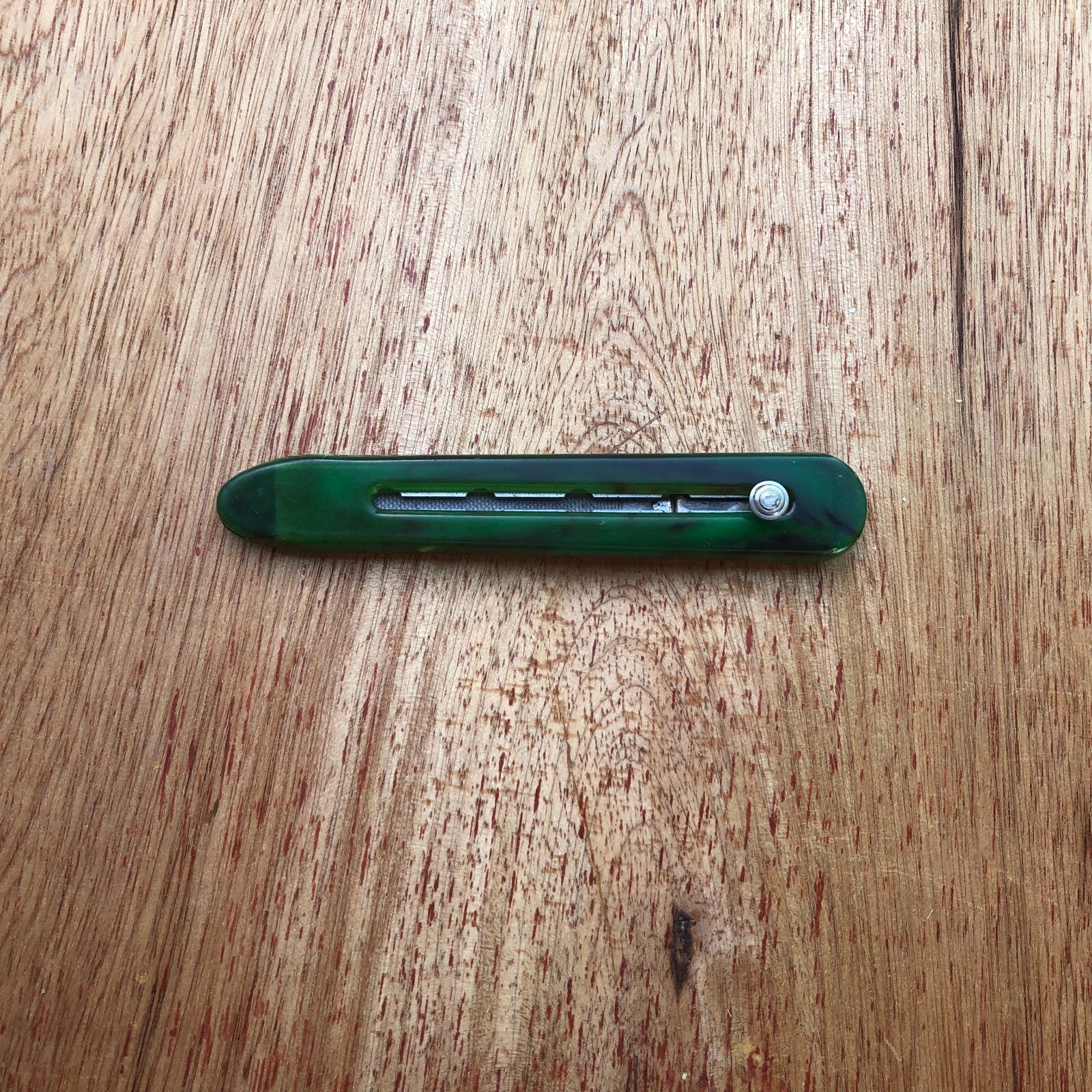Retractable Nail File Green Plastic Bakelite Celluloid Vintage Advertising Rough