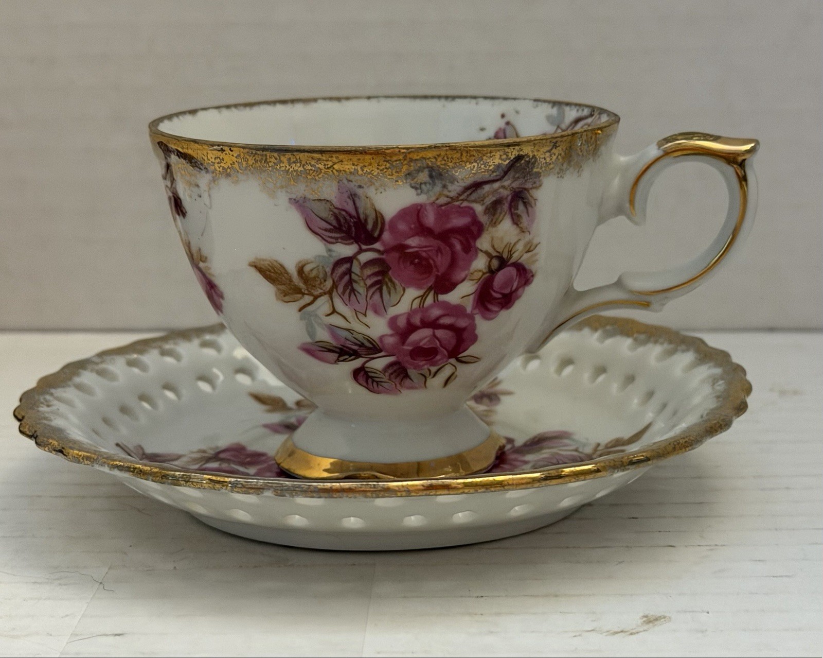 Vintage Porcelain Tea Cup and Saucer with Purple Floral Pattern and Gold Trim
