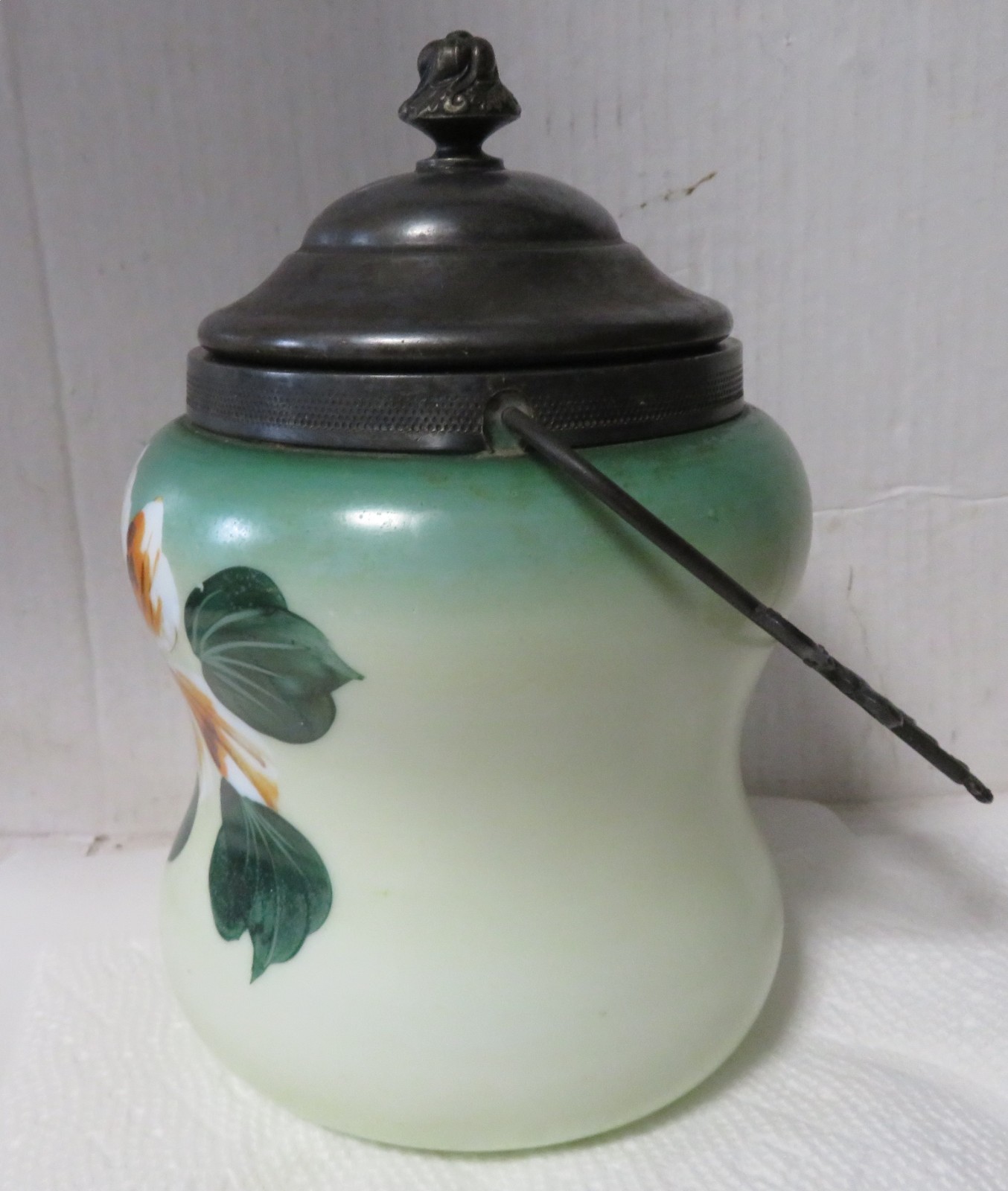 Antique floral decorated Biscuit jar with silver lid and handle