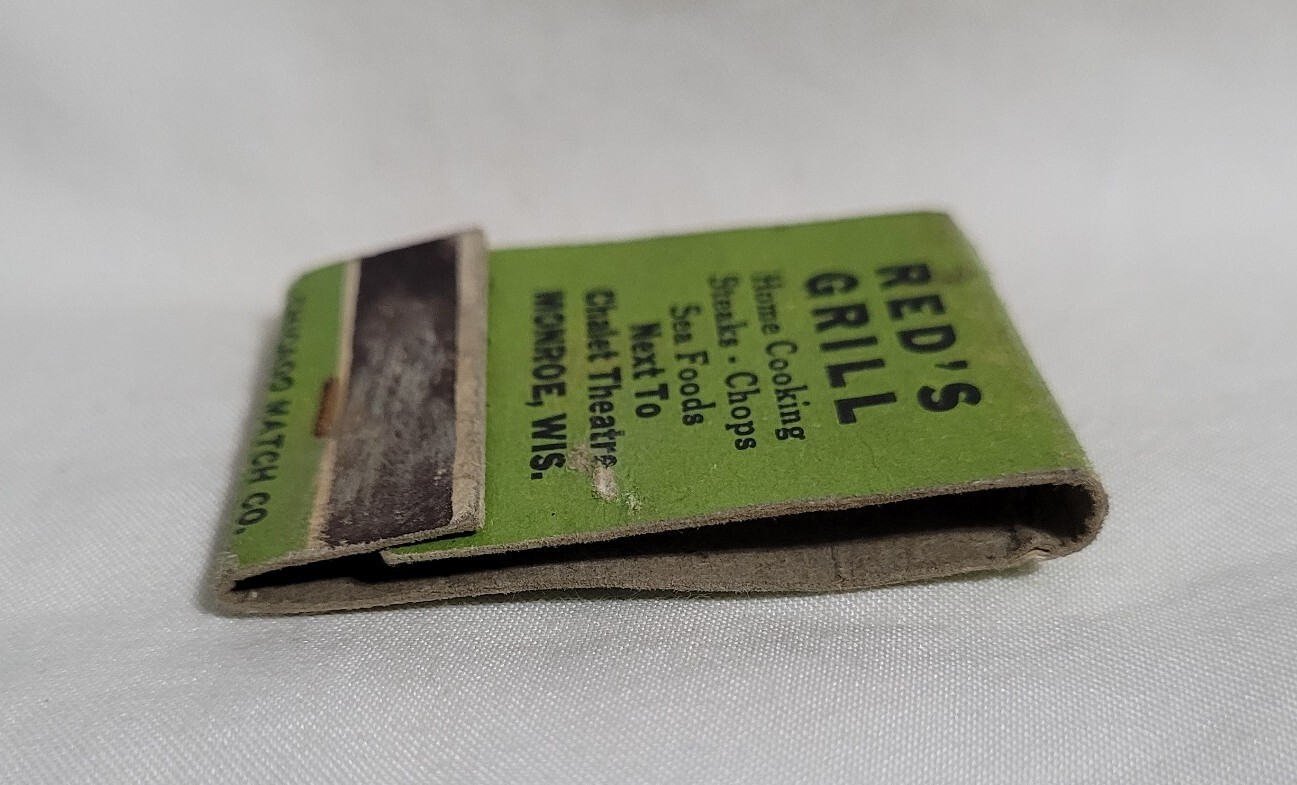Vintage Matchbook Cover Red’s Grill Restaurant Girl Monroe Wisconsin Advertising