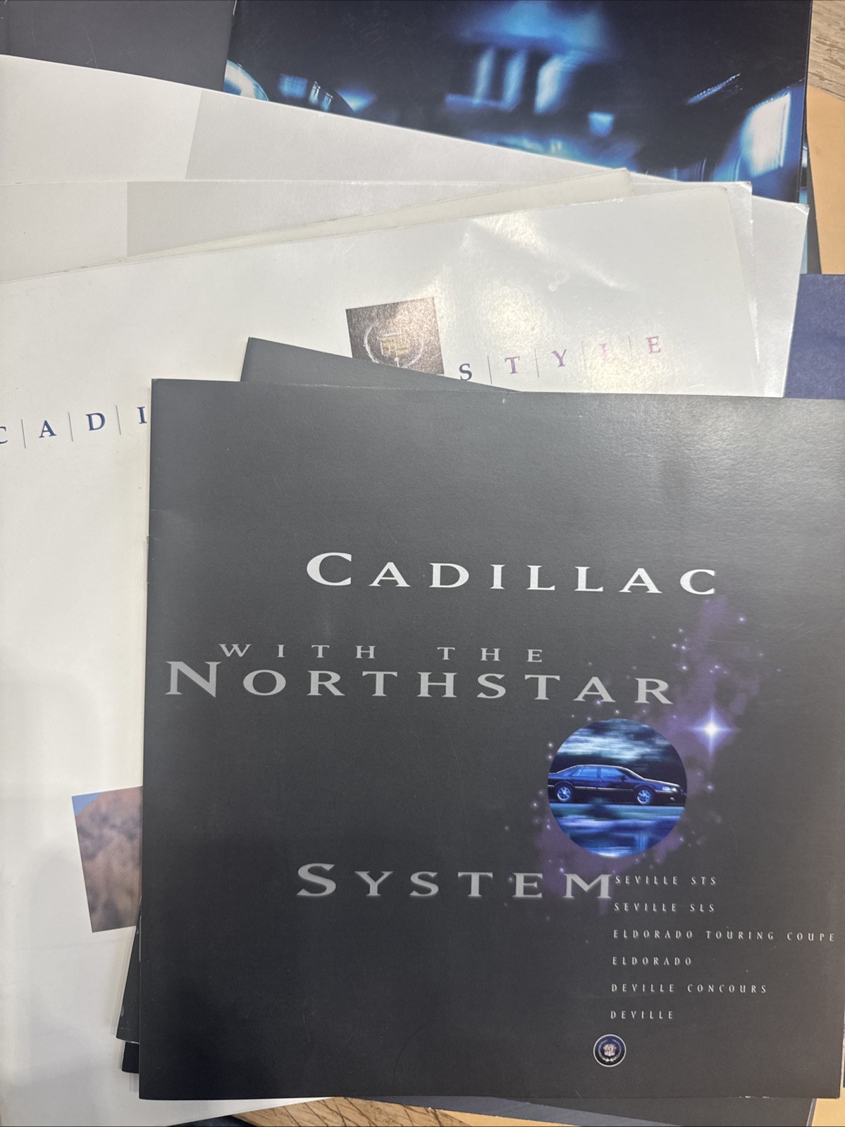 Cadillac Sales Brochures 1990-1999 – Lot of 15