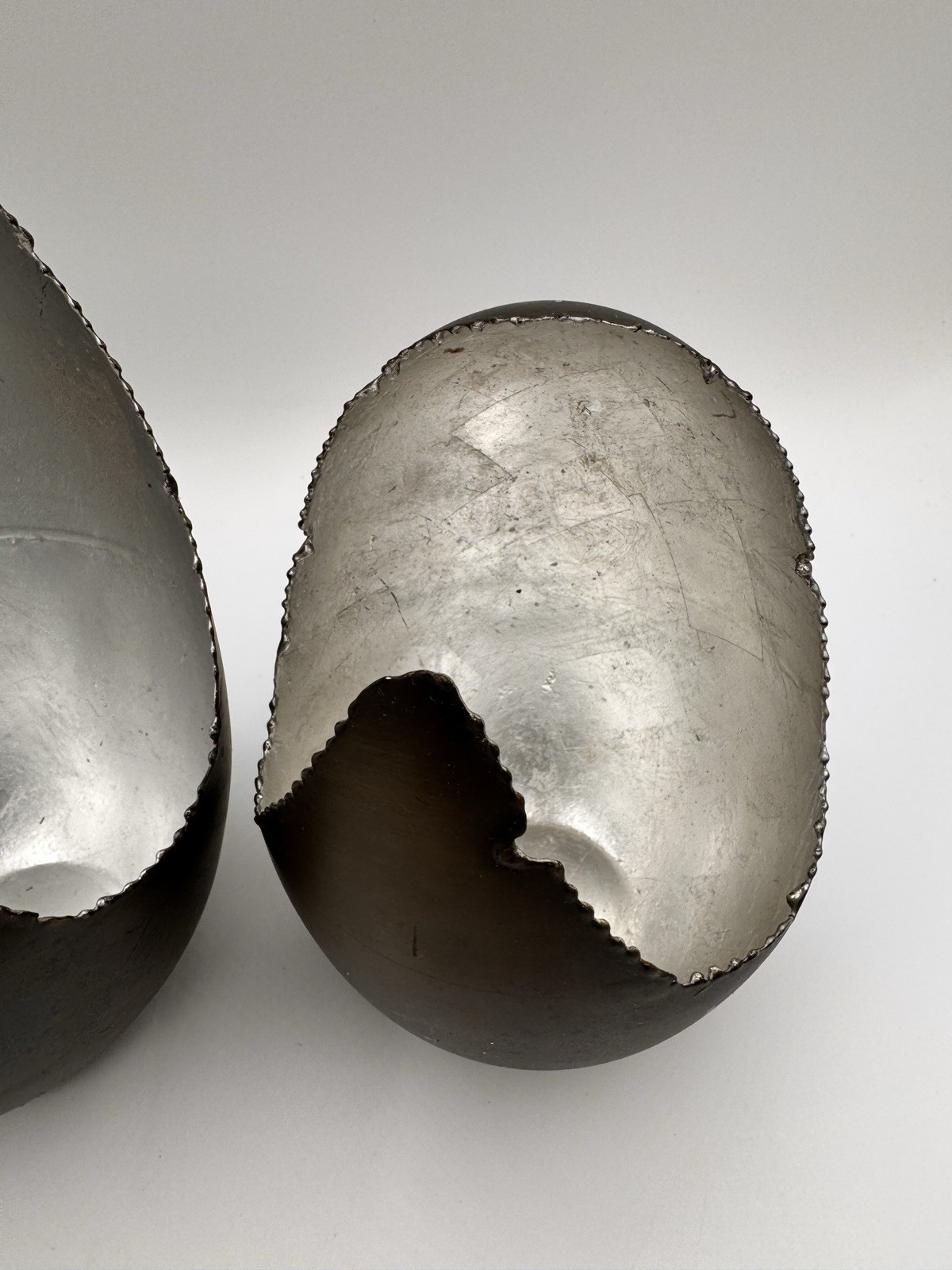 Handcrafted Cracked Egg Metal Sculptures Set 2 Black Silver Decor India