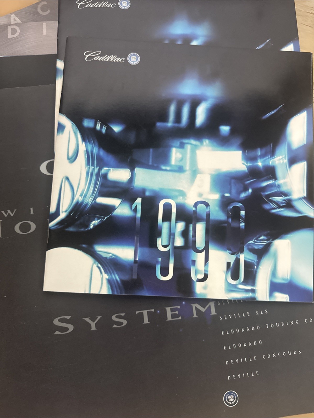 Cadillac Sales Brochures 1990-1999 – Lot of 15