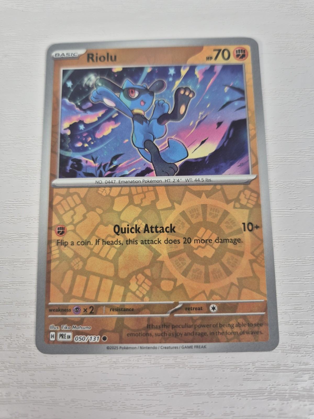 Riolu 050/131 – Prismatic Evolutions – Reverse Holo Pokemon TCG – NM