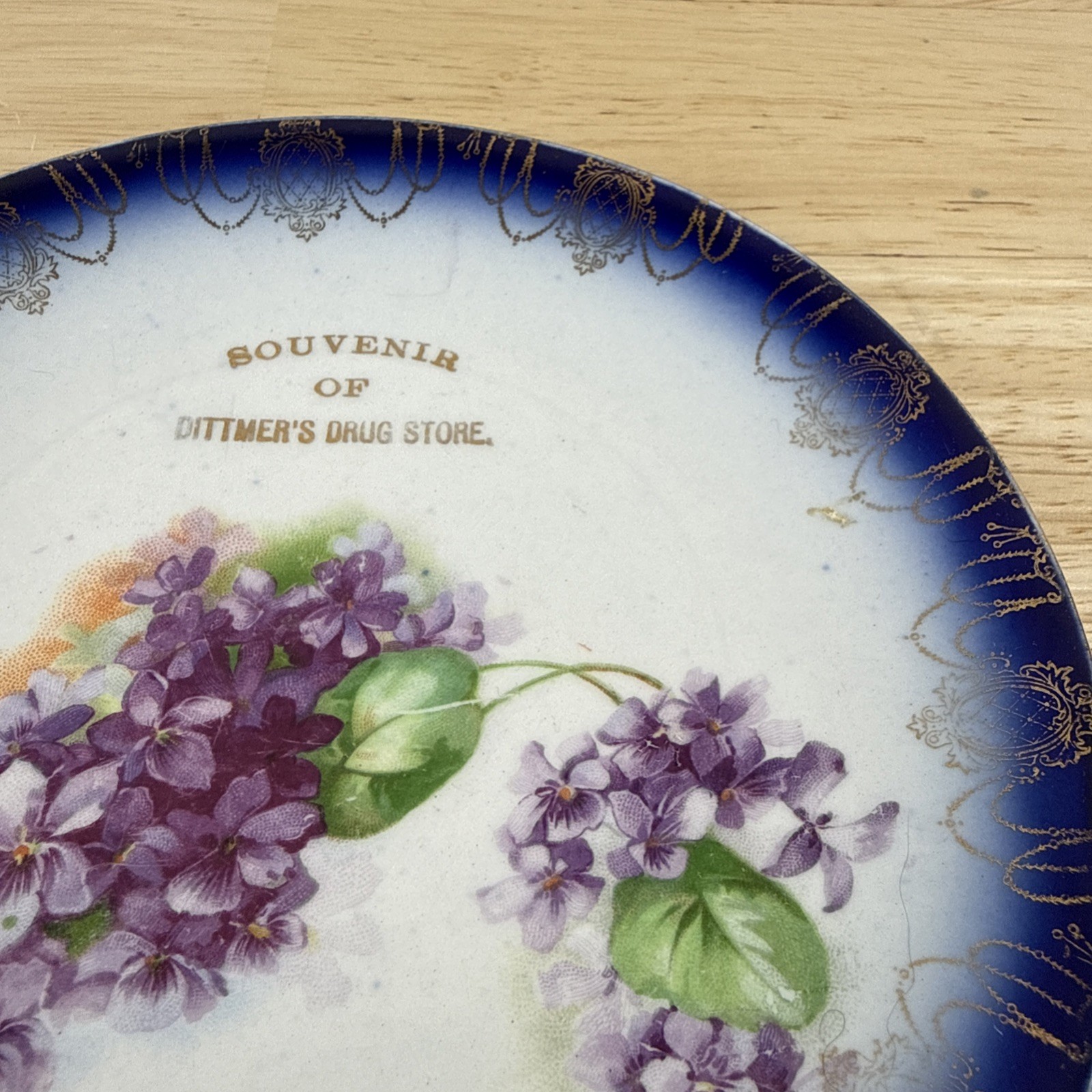 Dittmer’s Drug Store Souvenir Plate Blue Grape Sterling China Advertising