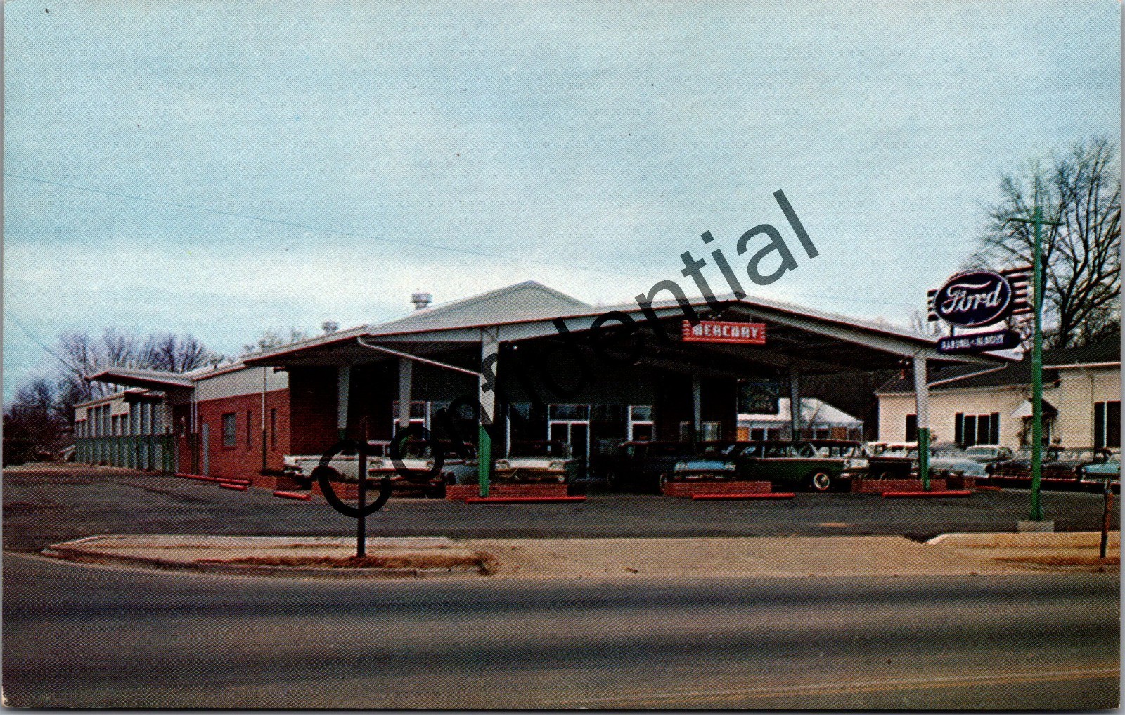 1950s Ford Car Auto Dealership w/ Old Cars In View Ad Auto Dealer Postcard V474