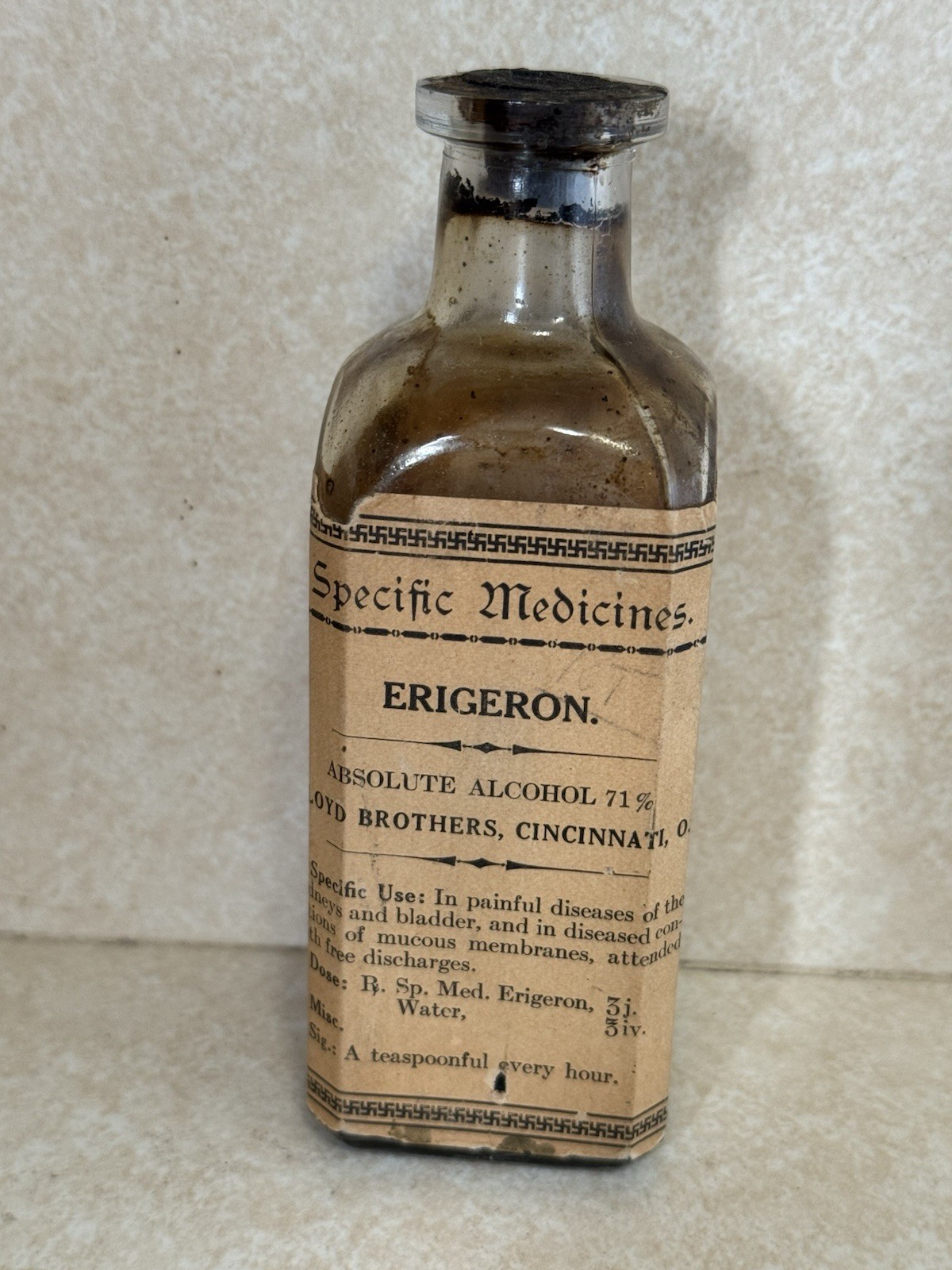 Antique Lloyd Brothers Specific Medicines Erigeron Bottle Swastika Border Cork