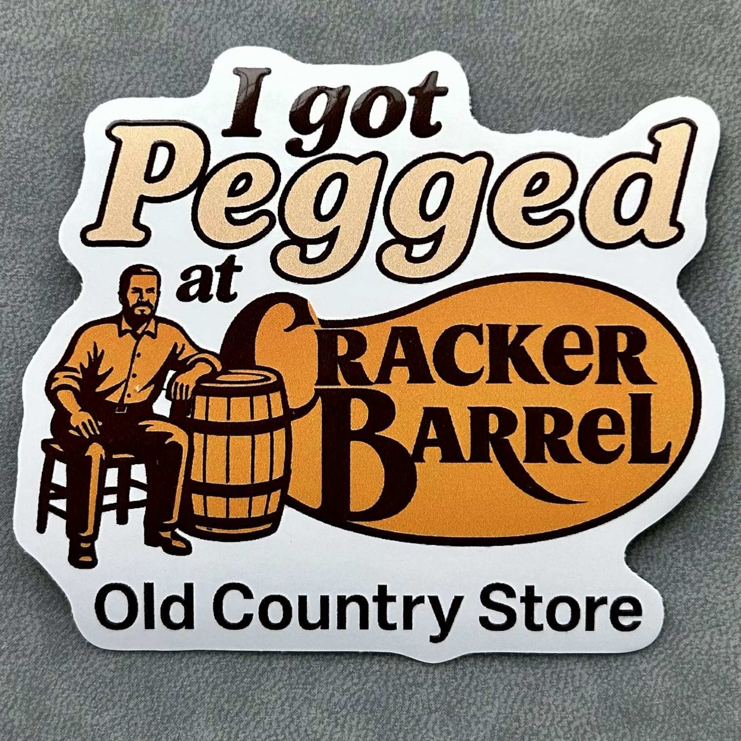 Funny 3″ Vinyl Cracker Barrel Sticker – “I Got Pegged” Design