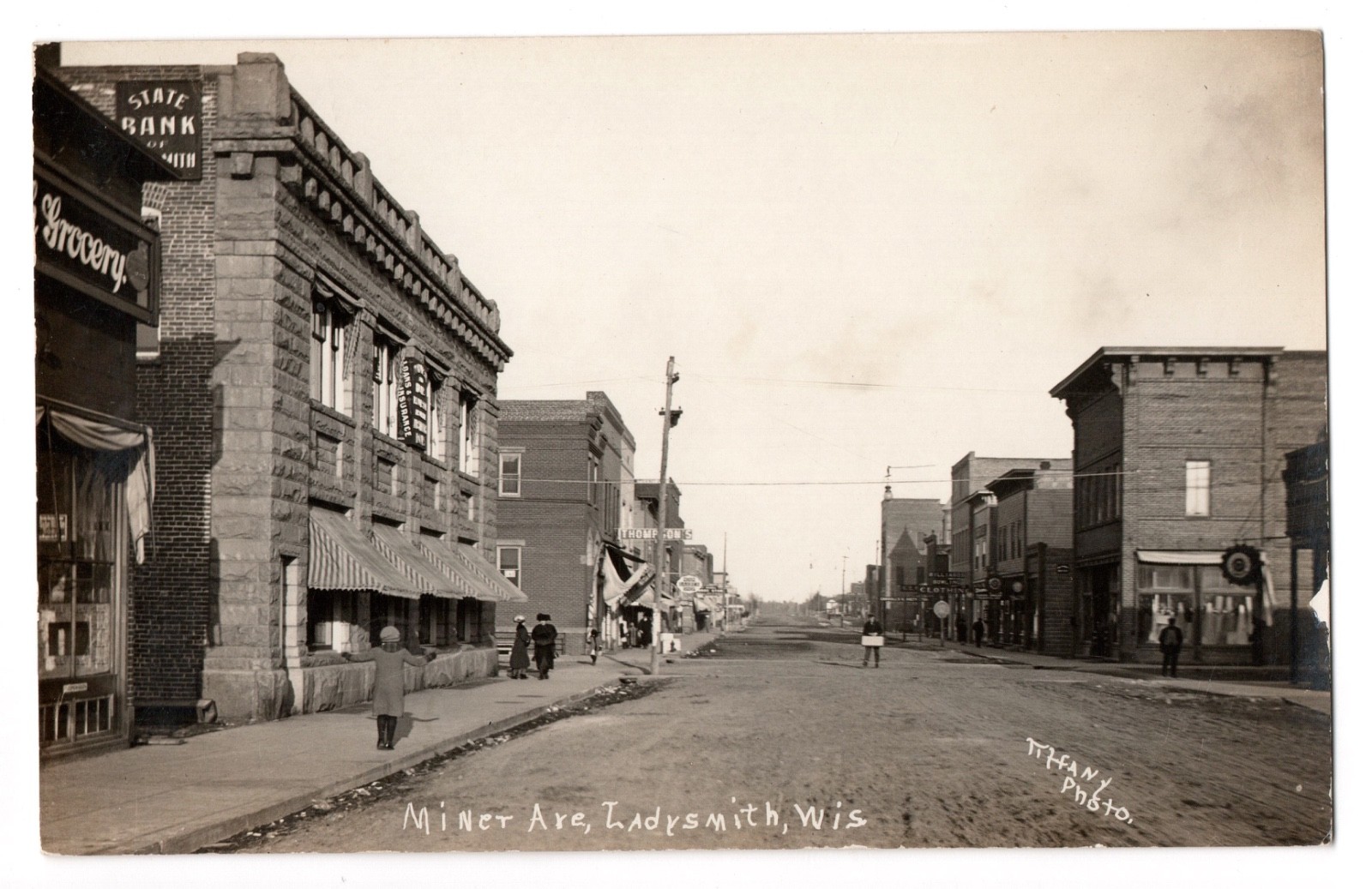 Real Photo Postcard RPPC Ladysmith Wisconsin Downtown Grocery State Bank People