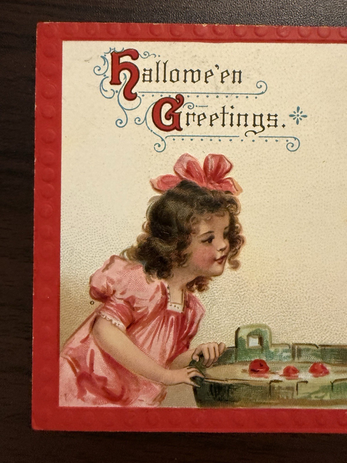 YOUNG GIRLS DOING APPLE DUNKING-AMID SQUEALS OF DELIGHT-HALLOWEEN POSTCARD
