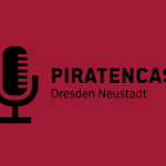 Das Bild zeigt ein Mikrofon und die Schrift "Piratencast Dresden Neustadt"